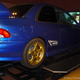 Illustration for article titled Japanese Initial D Arcade Booth Features Actual Tofu Car